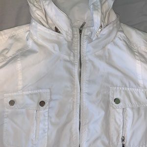 white windbreaker